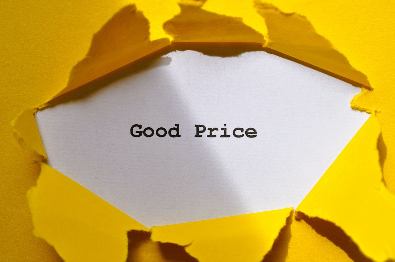 services-01 Yellow paper torn to reveal 'Good Price'. Perfect for sales and marketing concepts.